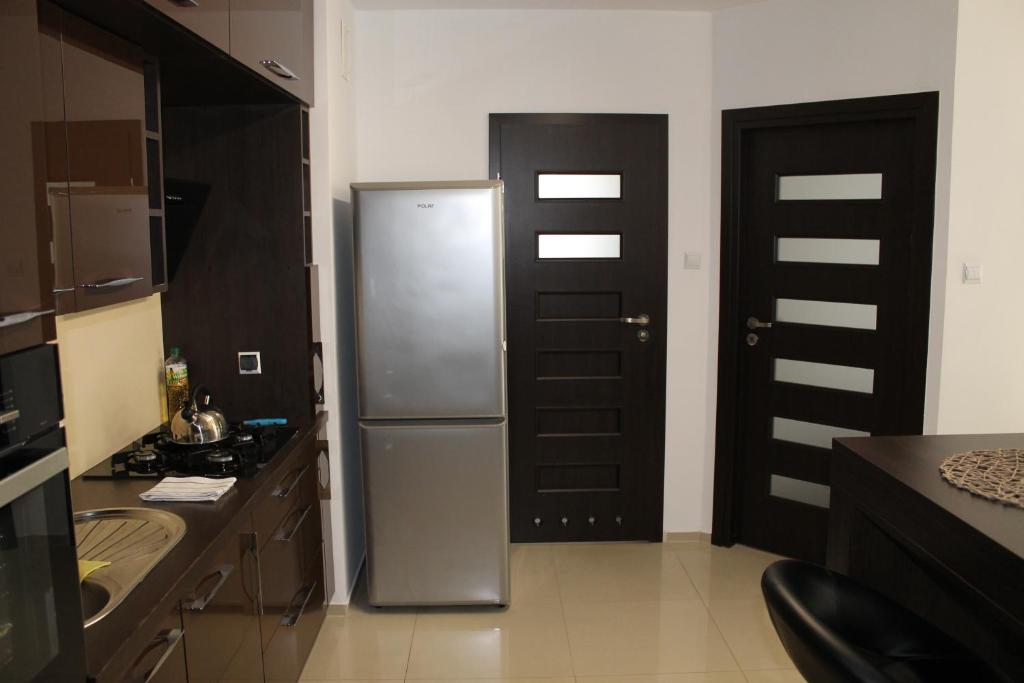 Kuchyňa alebo kuchynka v ubytovaní Apartament Antoniukowska 60