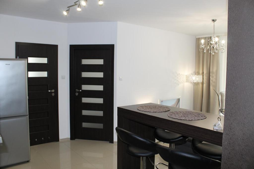 Kuchyňa alebo kuchynka v ubytovaní Apartament Antoniukowska 60