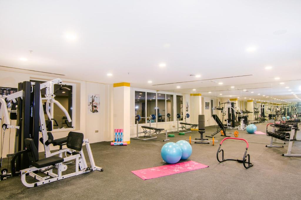 Fitness centrum a/nebo fitness zařízení v ubytování Al Murooj Grand Hotel