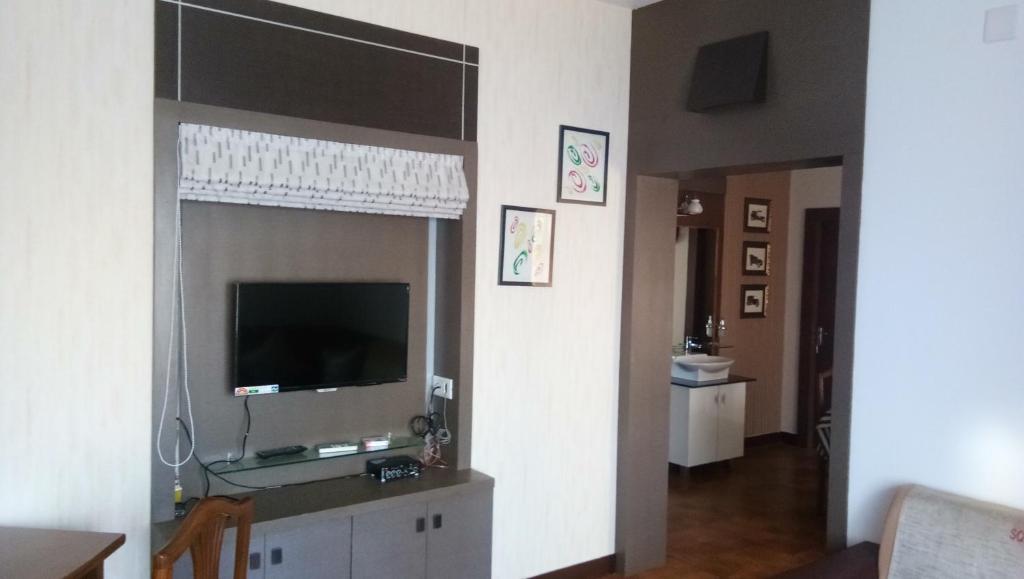 TV a/nebo společenská místnost v ubytování Square Suite