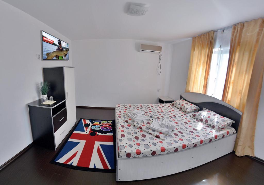 Postel nebo postele na pokoji v ubytování Casa ERIC
