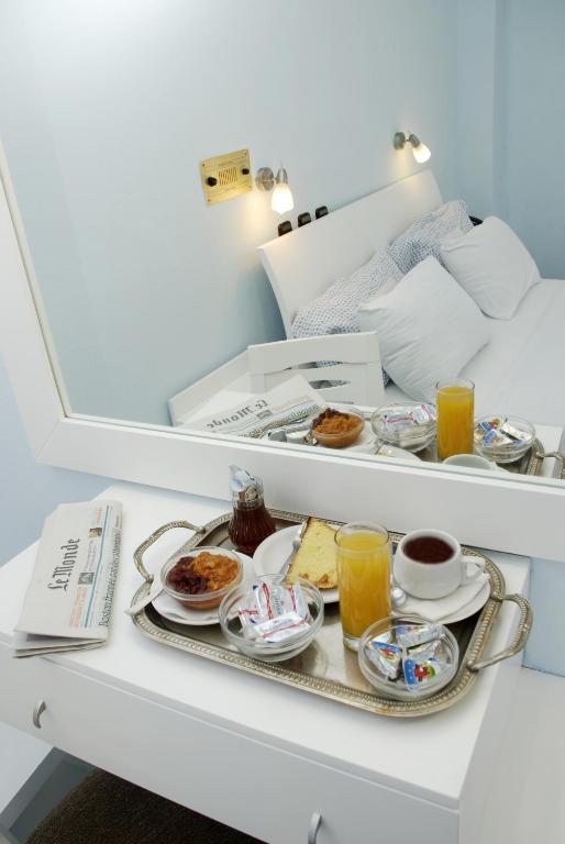 Postel nebo postele na pokoji v ubytování Hotel Galaxidi