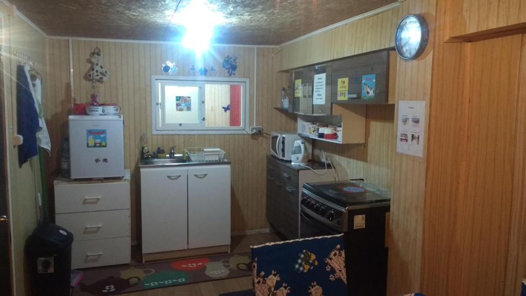 Kuchyň nebo kuchyňský kout v ubytování "Mi Hostal Tu Casa" Hostal Familiar SOLO EMPRESAS, TURISTAS y VIAJEROS Espacio para BICICLETAS y MOTOS
