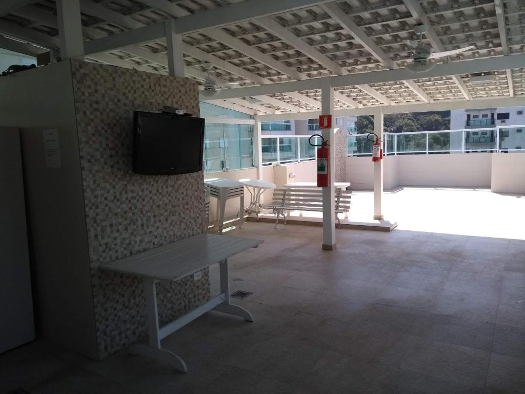  Apartamento Dulce Pitangueiras Guarujá com varanda
