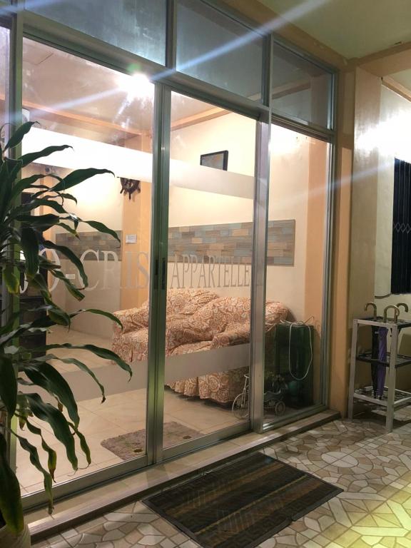 Postel nebo postele na pokoji v ubytování Jo-Cris Apartelle