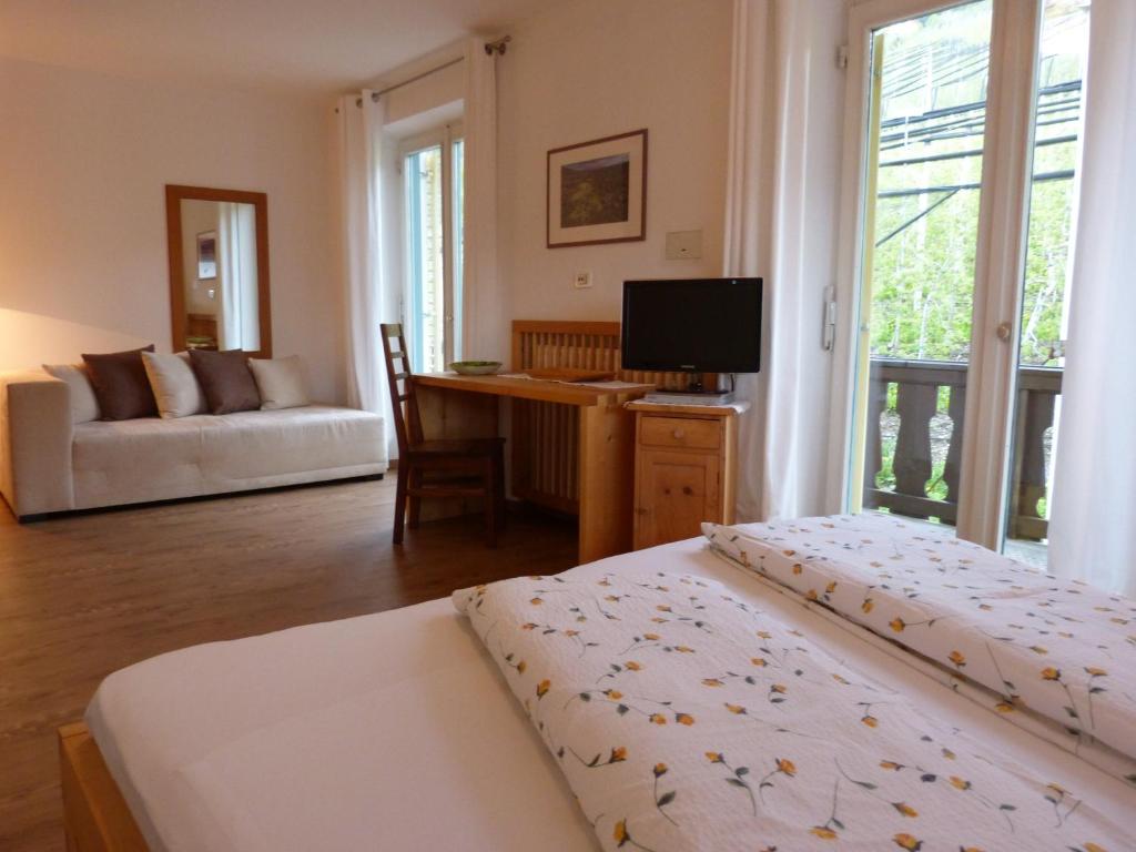 Postel nebo postele na pokoji v ubytování Pension Chalet Andy