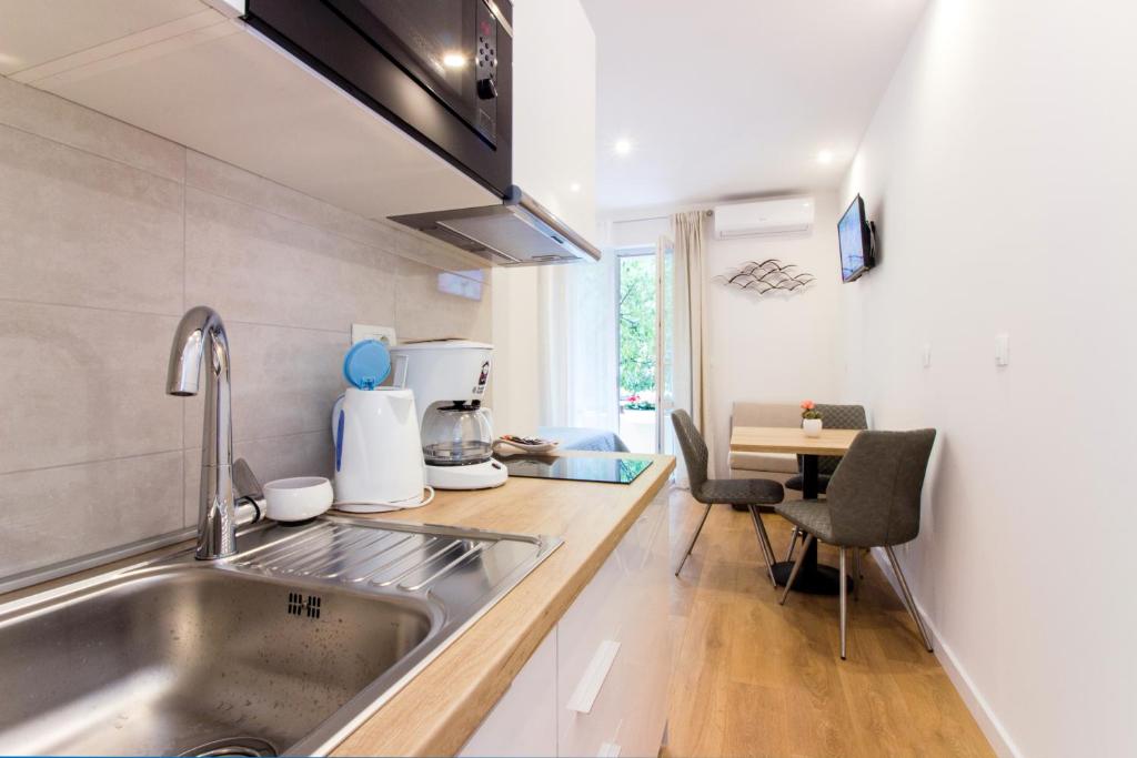 Kuchyňa alebo kuchynka v ubytovaní Lugo Apartments