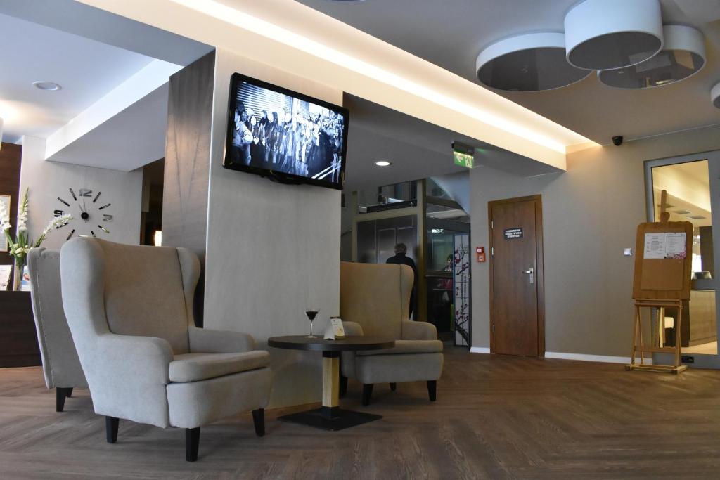 TV a/nebo společenská místnost v ubytování Hotel *** NAT Ustroń