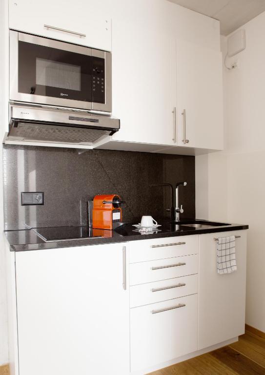 Kuchyň nebo kuchyňský kout v ubytování Residence Appartements