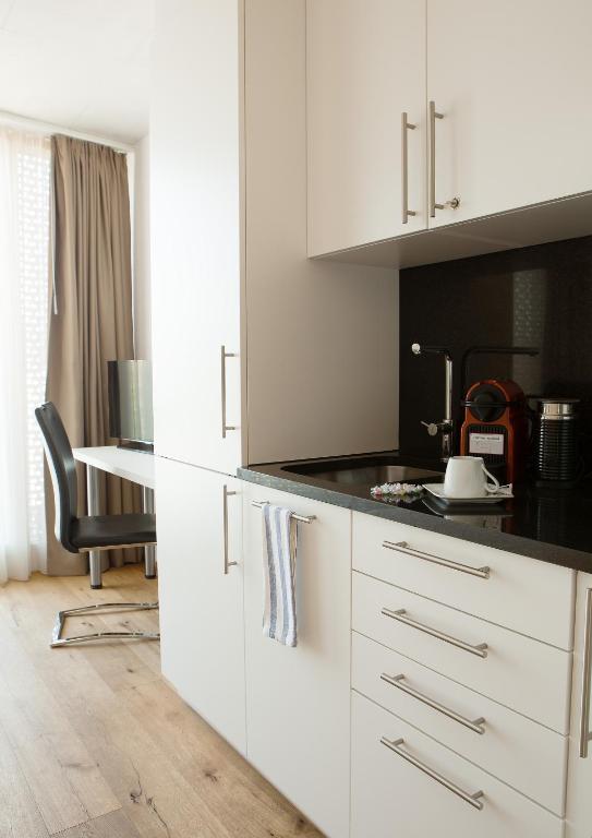 Kuchyň nebo kuchyňský kout v ubytování Residence Appartements