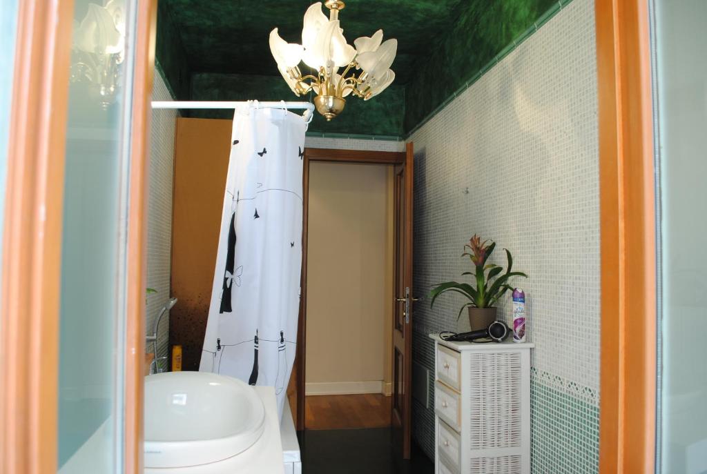 Kúpeľňa v ubytovaní Dreaming Piazza Bra Rooms