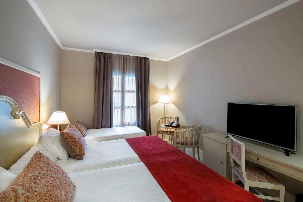 
Triple Room (3 Adults)
