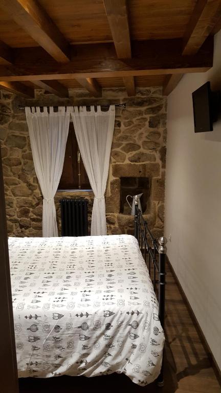 Posteľ alebo postele v izbe v ubytovaní Casa Do Pazo