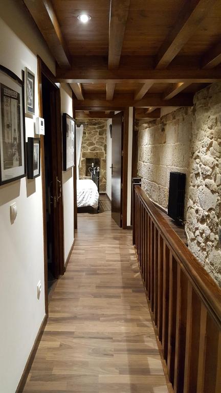 Televízia a/alebo spoločenská miestnosť v ubytovaní Casa Do Pazo