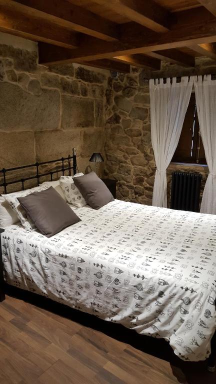 Posteľ alebo postele v izbe v ubytovaní Casa Do Pazo