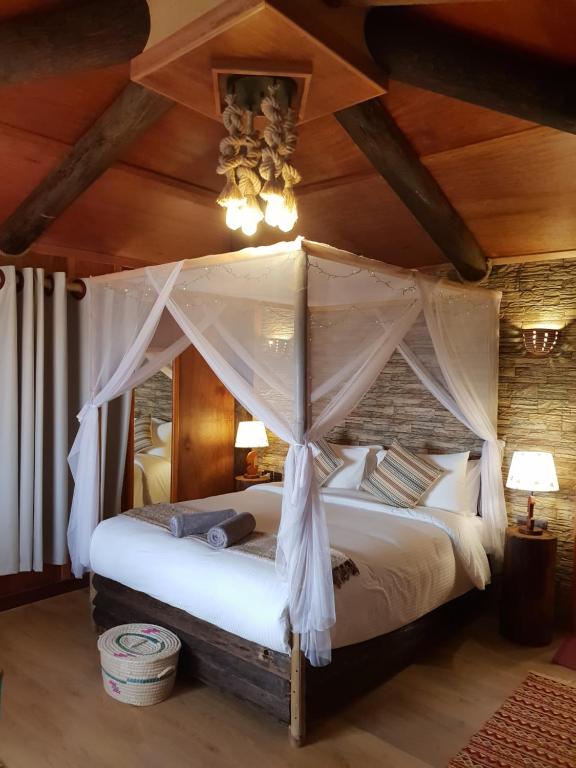 Postel nebo postele na pokoji v ubytování Souly Ecolodge Salalah