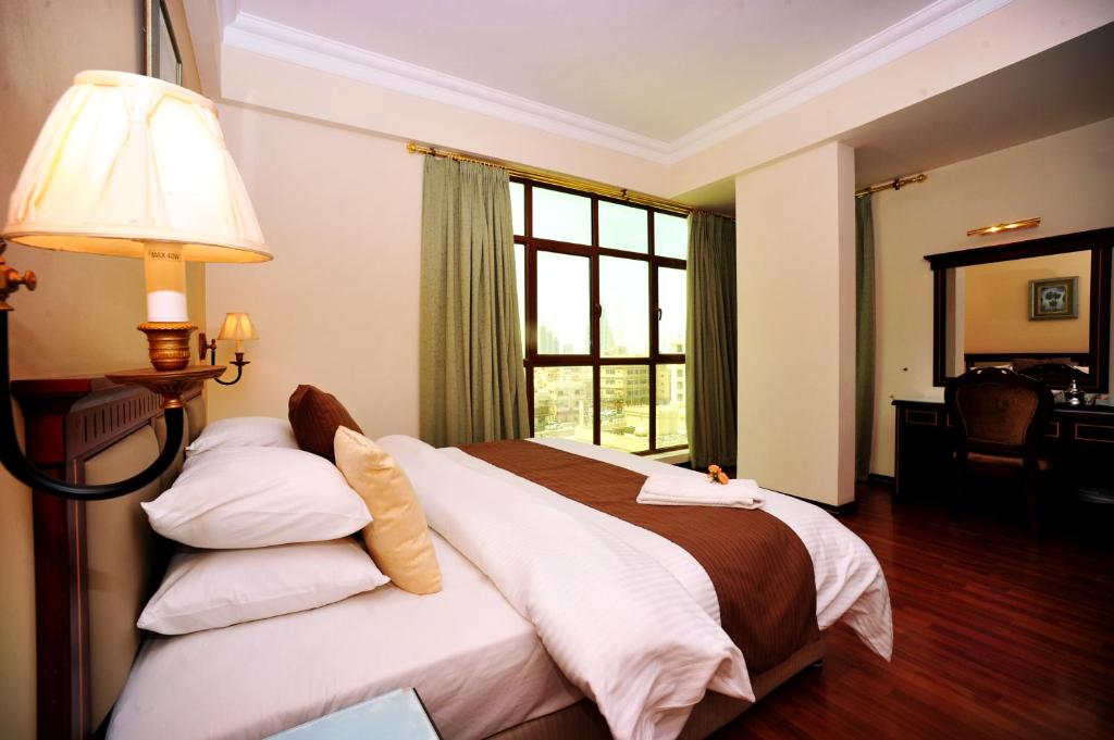 Ліжко або ліжка в номері Marco Polo Hotel