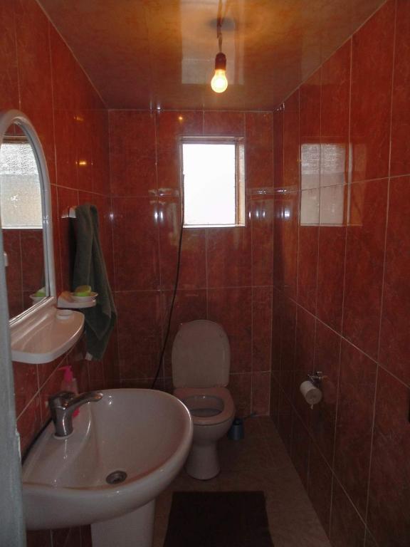 Koupelna v ubytování Jimsher Naveriani Guesthouse