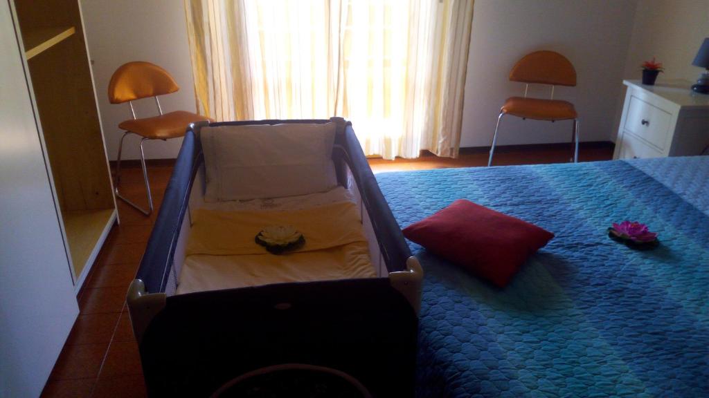 Un pat sau paturi într-o cameră la Casa Venturi