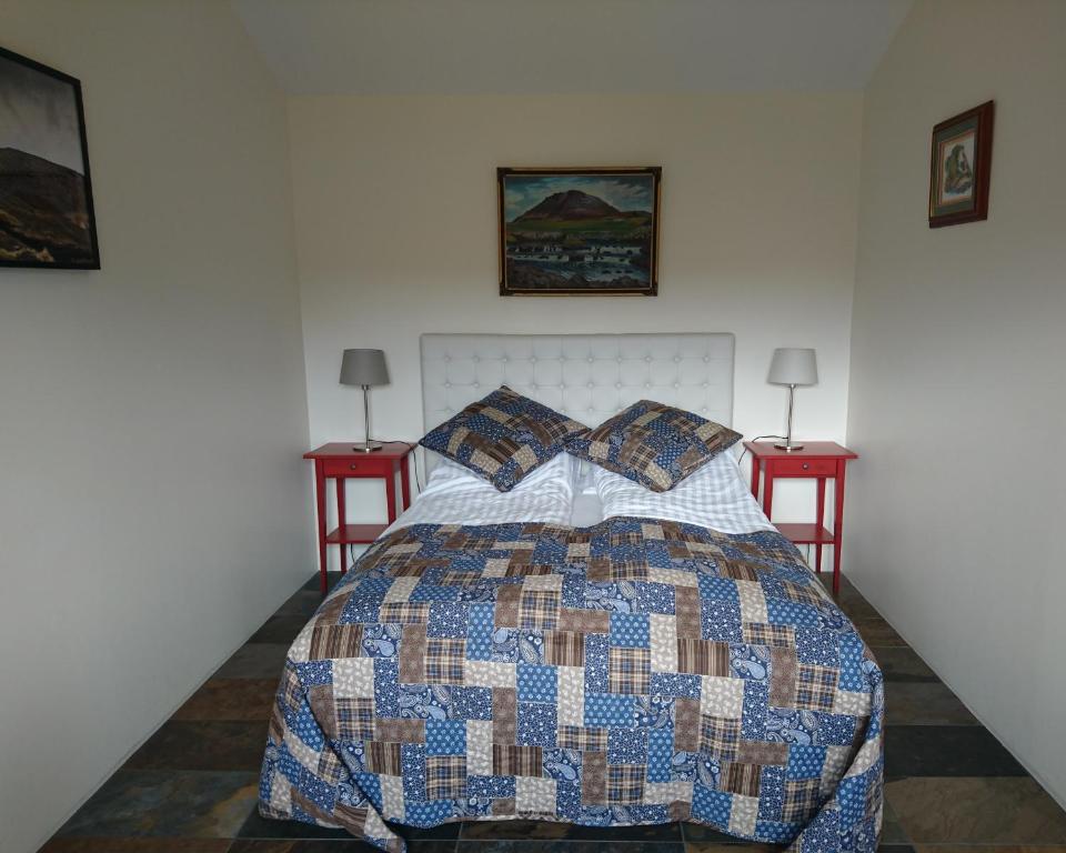 Postel nebo postele na pokoji v ubytování Fossatún Country Hotel