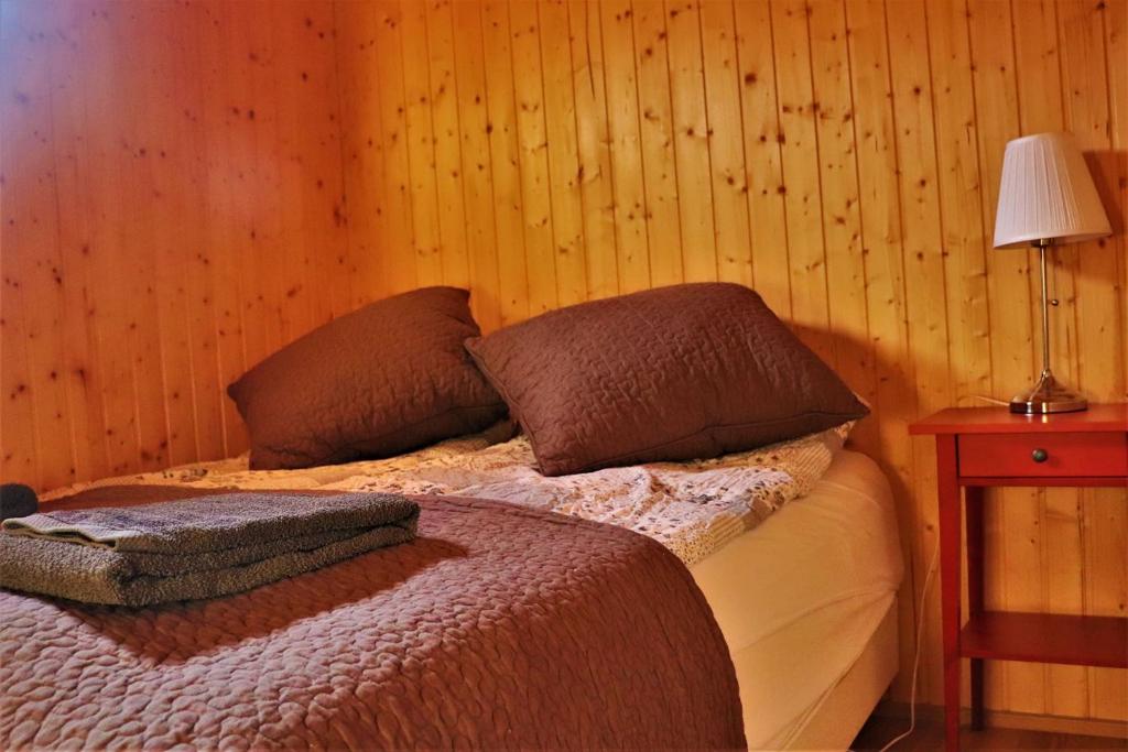 Postel nebo postele na pokoji v ubytování Fossatún Sunset Cottage