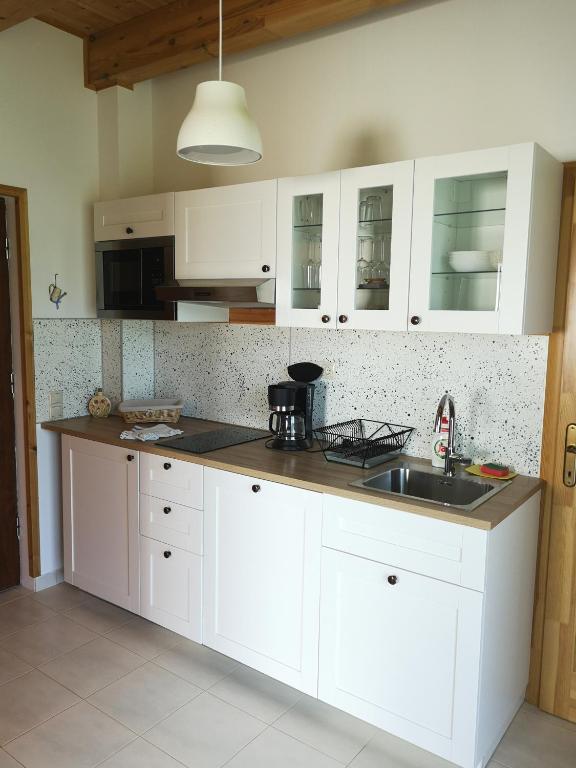 A kitchen or kitchenette at Haus Edelgrün