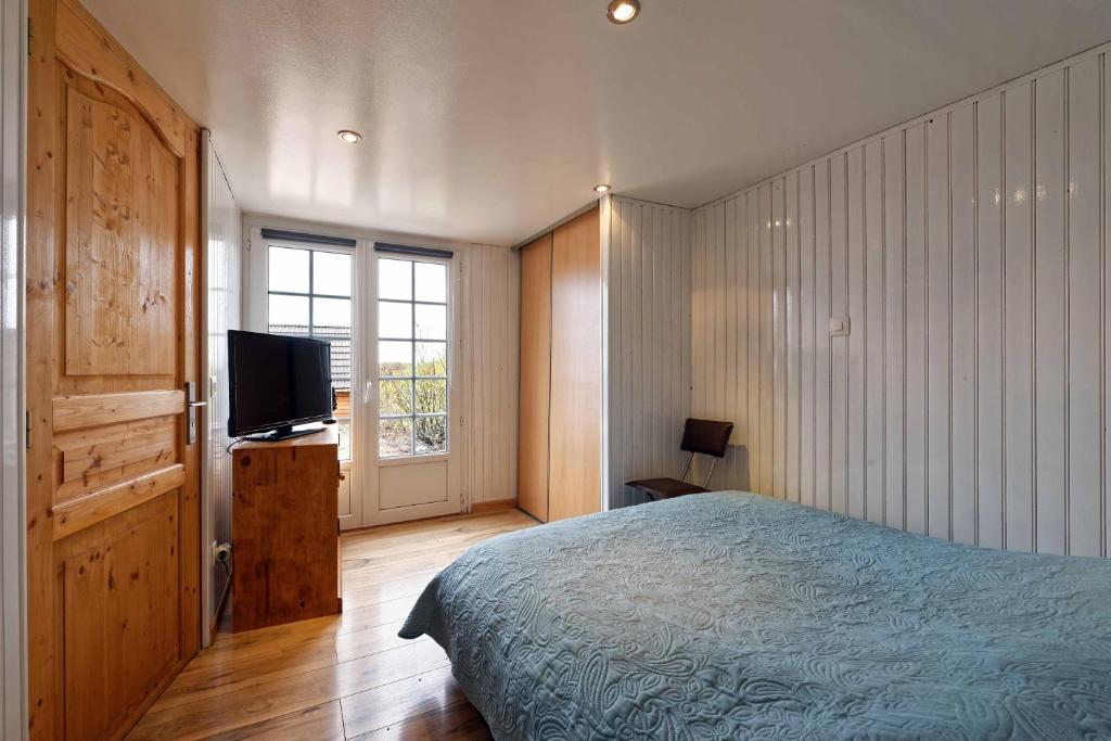 Postel nebo postele na pokoji v ubytování Chambres d'hotes à Autun