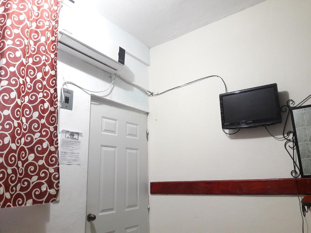 TV a/nebo společenská místnost v ubytování Hotel Naj Kin
