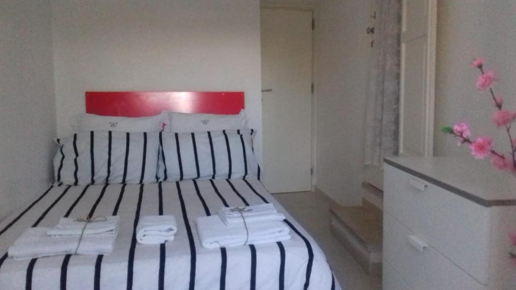 Postel nebo postele na pokoji v ubytování Corte San Biagio,29