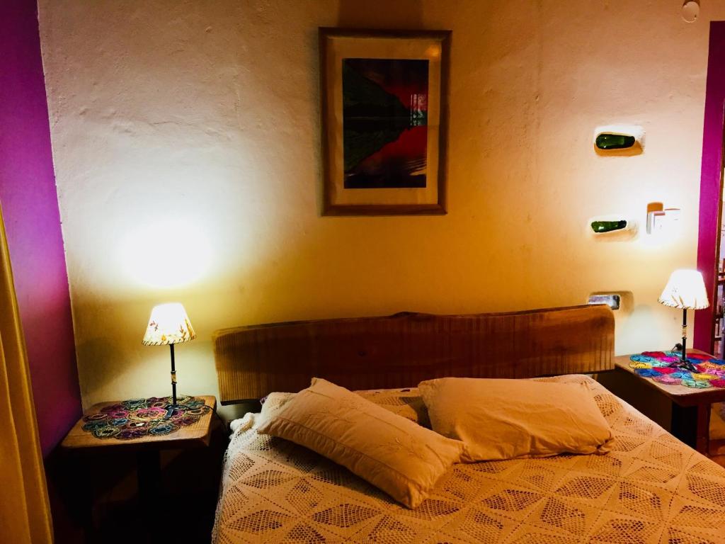 Postel nebo postele na pokoji v ubytování Granja La Lechuza Ecolodge