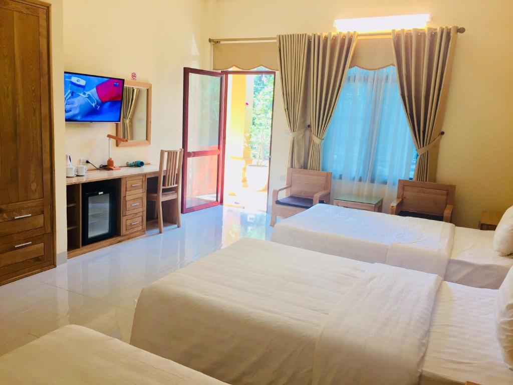 Hoang Giang Homestay - Habitación Triple Con Vista Al Jardín