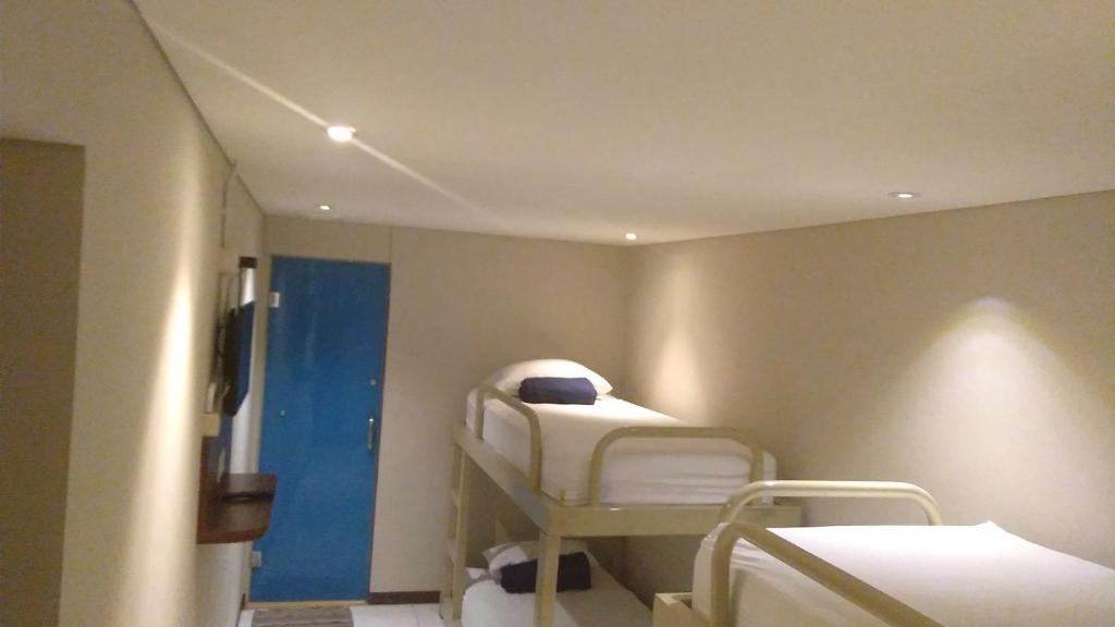 Postel nebo postele na pokoji v ubytování Subwow Hostel