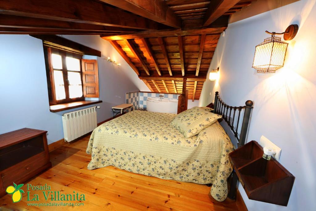 Ένα ή περισσότερα κρεβάτια σε δωμάτιο στο Posada La Villanita