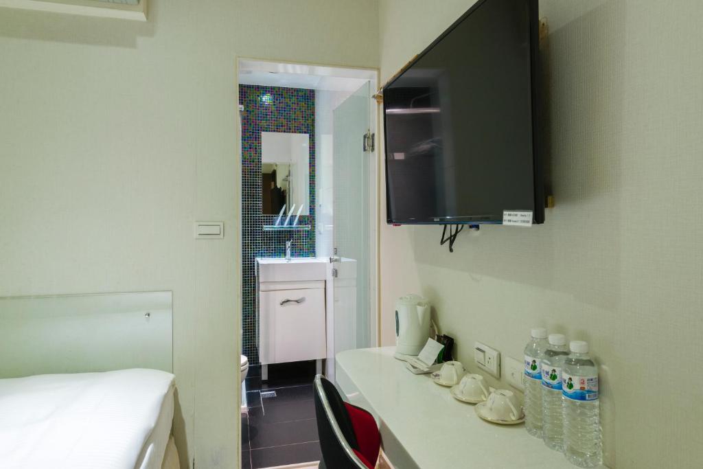 TV a/nebo společenská místnost v ubytování Shihlin Metro Home