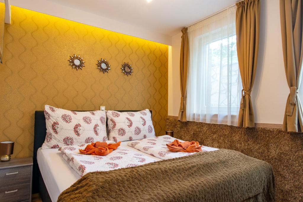 Кровать или кровати в номере Soline Bay Seashore Residence