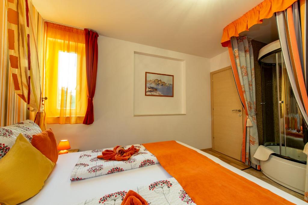 Кровать или кровати в номере Soline Bay Seashore Residence
