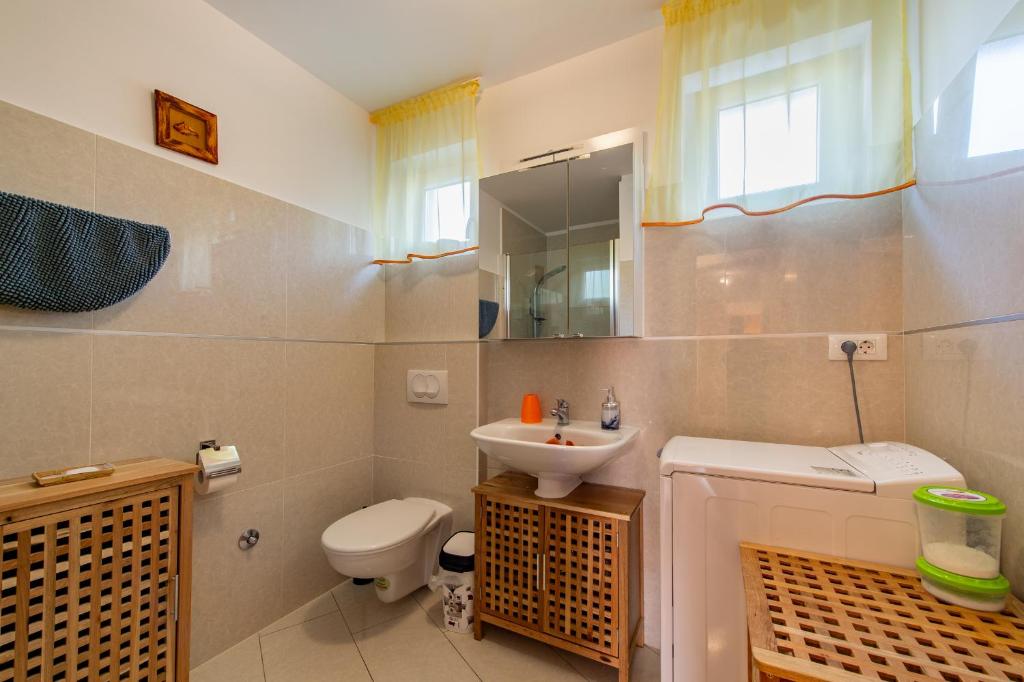 Ванная комната в Soline Bay Seashore Residence