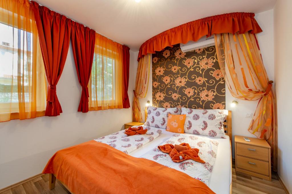 Кровать или кровати в номере Soline Bay Seashore Residence