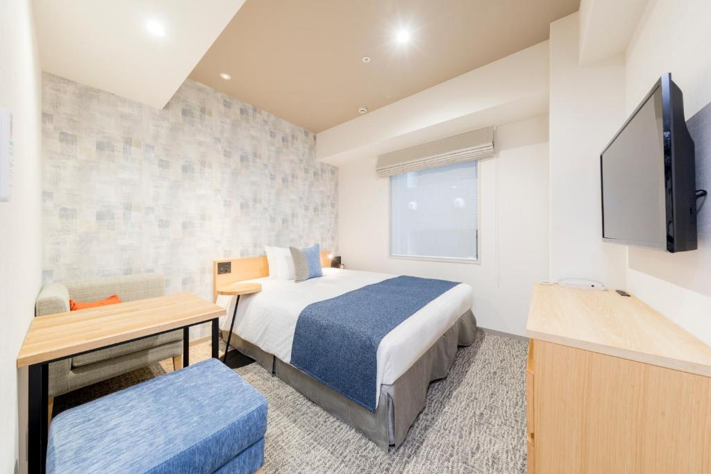 TV a/nebo společenská místnost v ubytování Tokyu Stay Takanawa Shinagawa Area