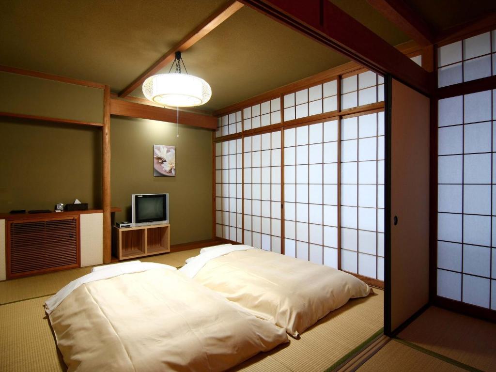 Sjónvarps- og/eða afþreyingartæki á Breezbay Seaside Resort Atami