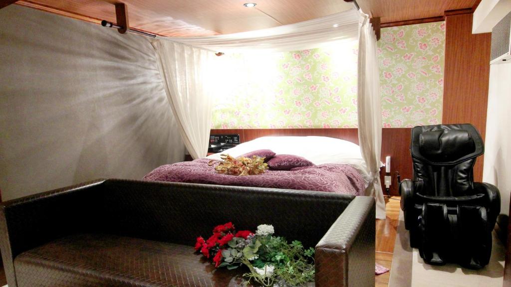 Postel nebo postele na pokoji v ubytování agehA - Adult Only-