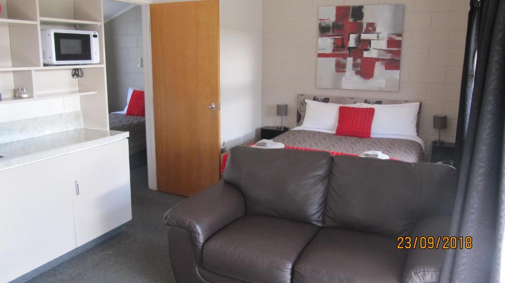 Kuchyň nebo kuchyňský kout v ubytování Ahuriri Motels