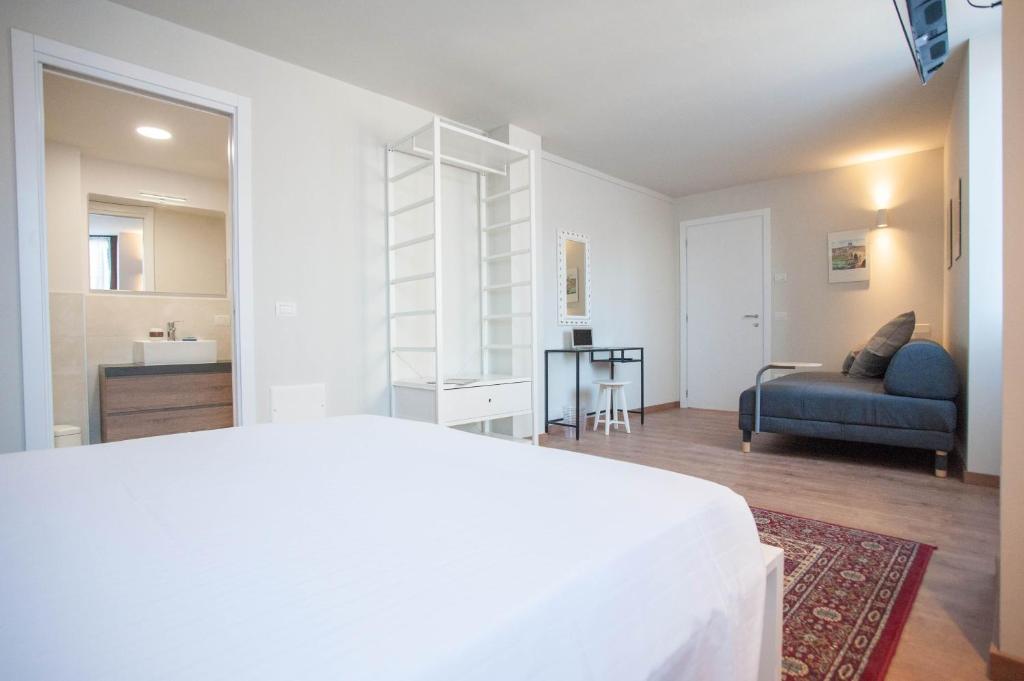 Postel nebo postele na pokoji v ubytování Italianflat - Verona Suite