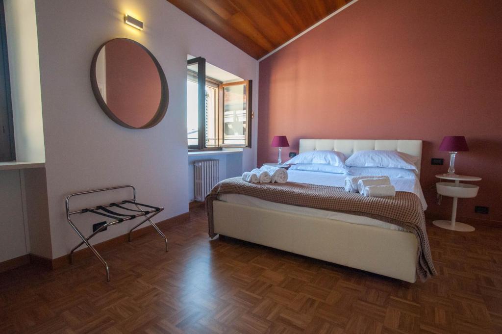 Postel nebo postele na pokoji v ubytování Italianflat - Verona Suite