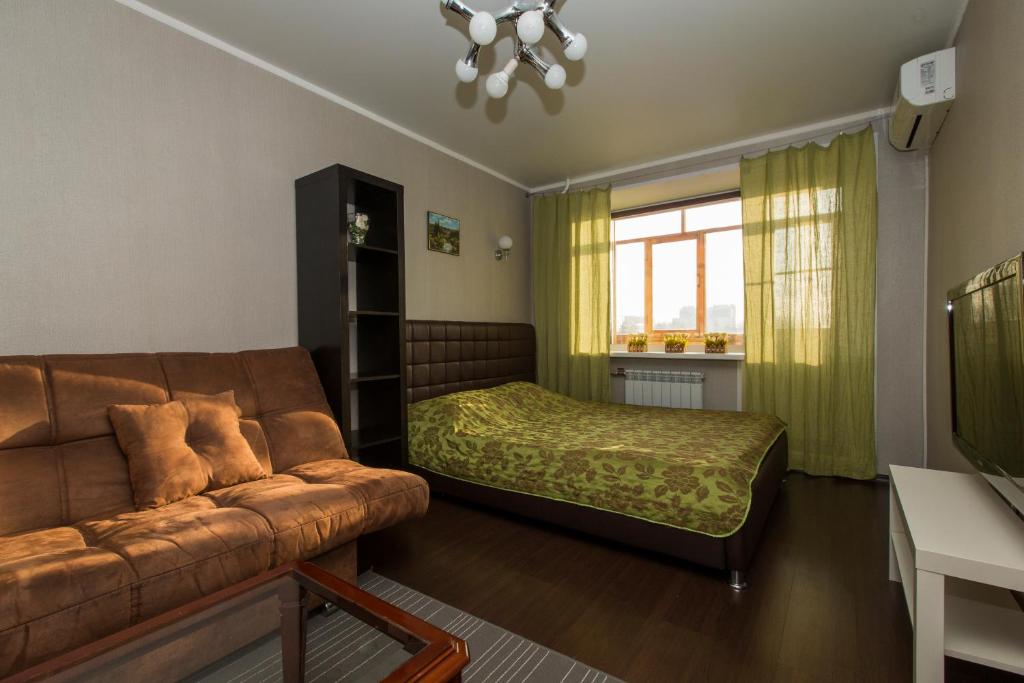 Cama o camas de una habitación en Apartment on Belinskogo 49