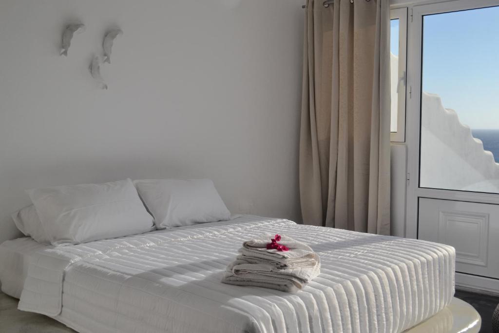 Postel nebo postele na pokoji v ubytování Golden Beach Resort Anafi