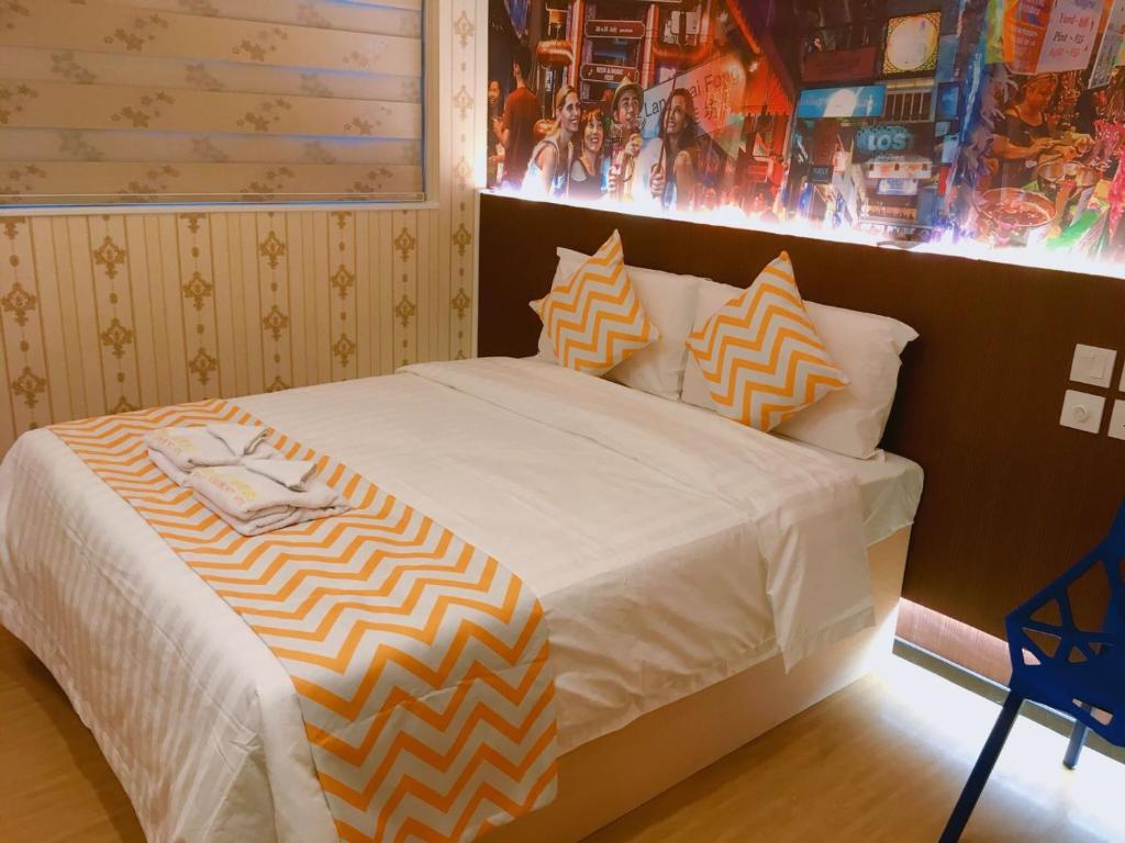 Postel nebo postele na pokoji v ubytování Whole Sunshine International Hotel