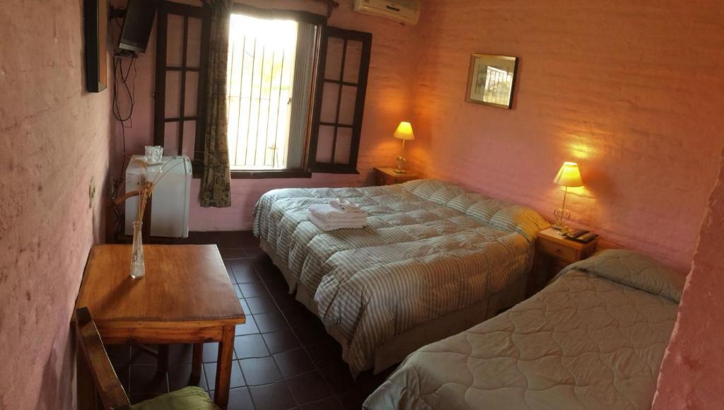 Postel nebo postele na pokoji v ubytování Posada del Navegante