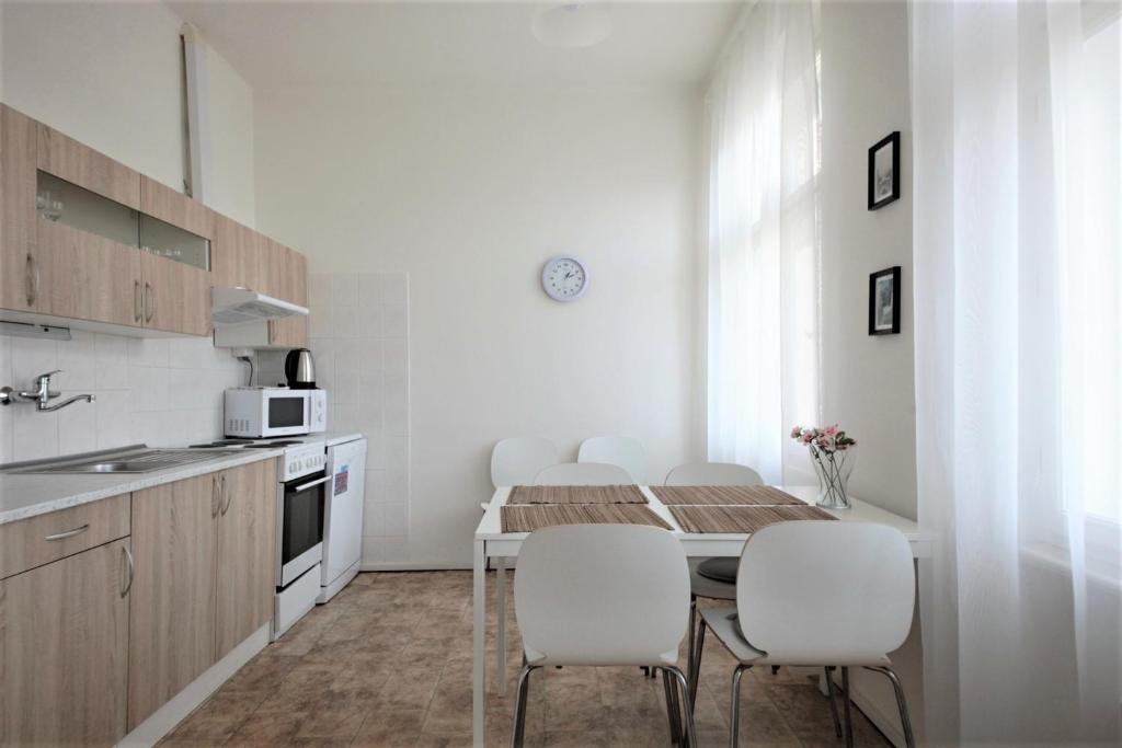 Kuchyň nebo kuchyňský kout v ubytování Angel City Aparthotel
