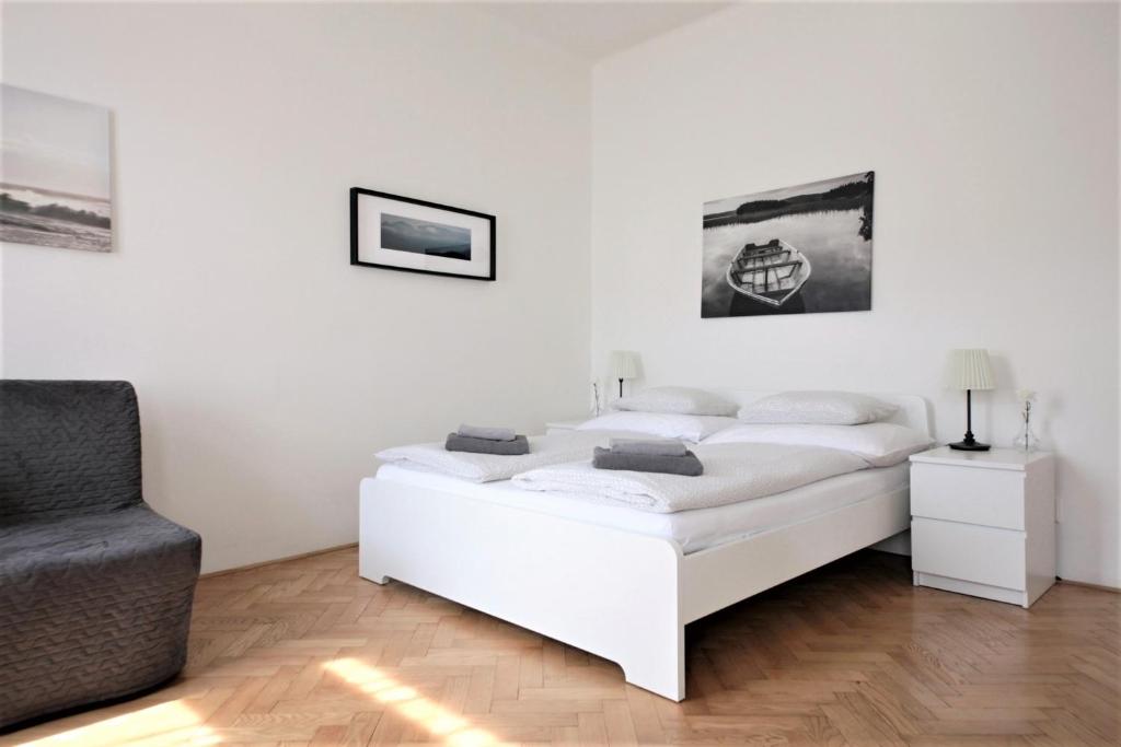 Postel nebo postele na pokoji v ubytování Angel City Aparthotel